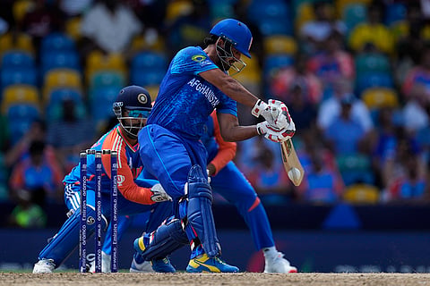 Najibullah Zadran plays a shot against India